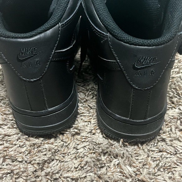 high top all black air force ones
